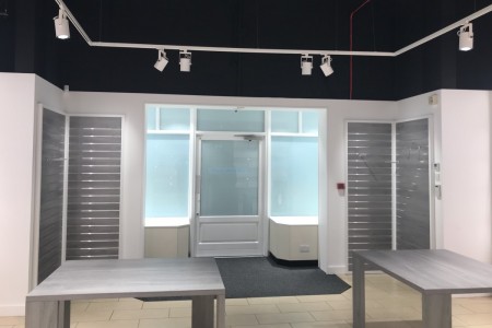 Le Creuset, Freeport, Braintree - white and grey hardwood shopfitting
