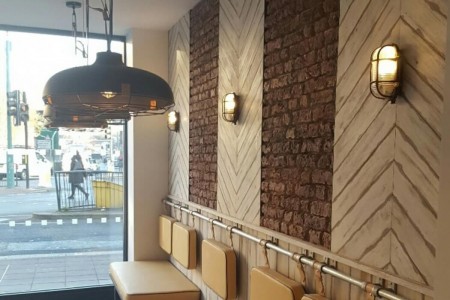 Prezzo, Epsom - close up of round, industrial style light fittings