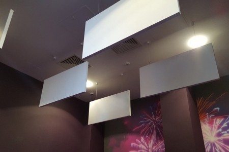 Astor House has many creative installations, including this with its deep purple and grey walls and ceiling hangings