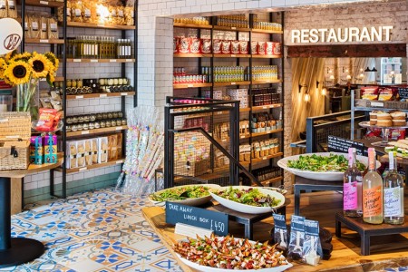 Wildwood, Crawley - mosaic tile floor, shop area with products on wooden shelving and tables