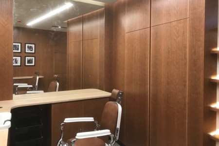 Aqua Di Parma bespoke installation including mirrors, cupboards, chairs, desks