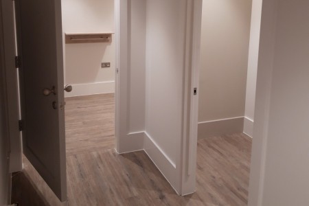 The White Company, Windsor - white walls and doors, wooden floor